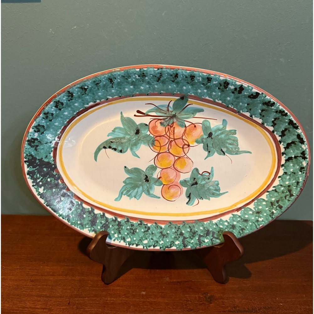 Large Italian wall platter in Neapolitan majolica green border and Grapes